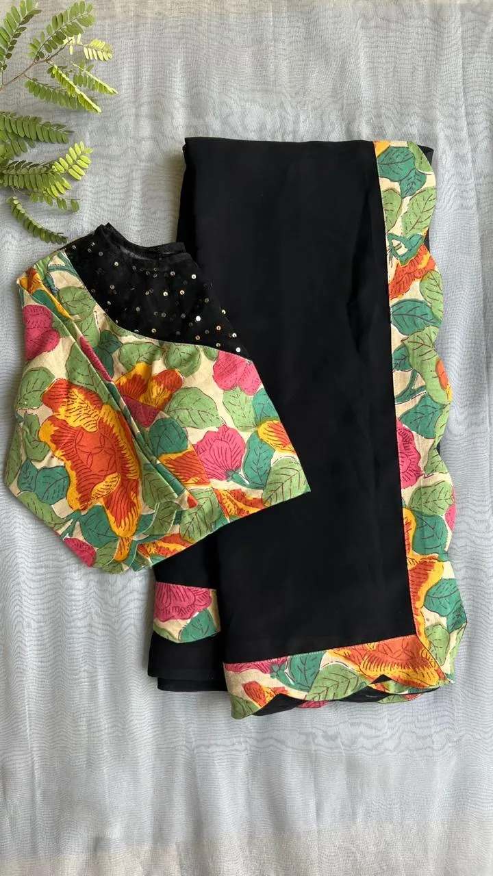 Black georgette saree with floral cotton blouse