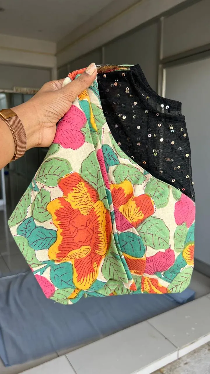 Black georgette saree with floral cotton blouse