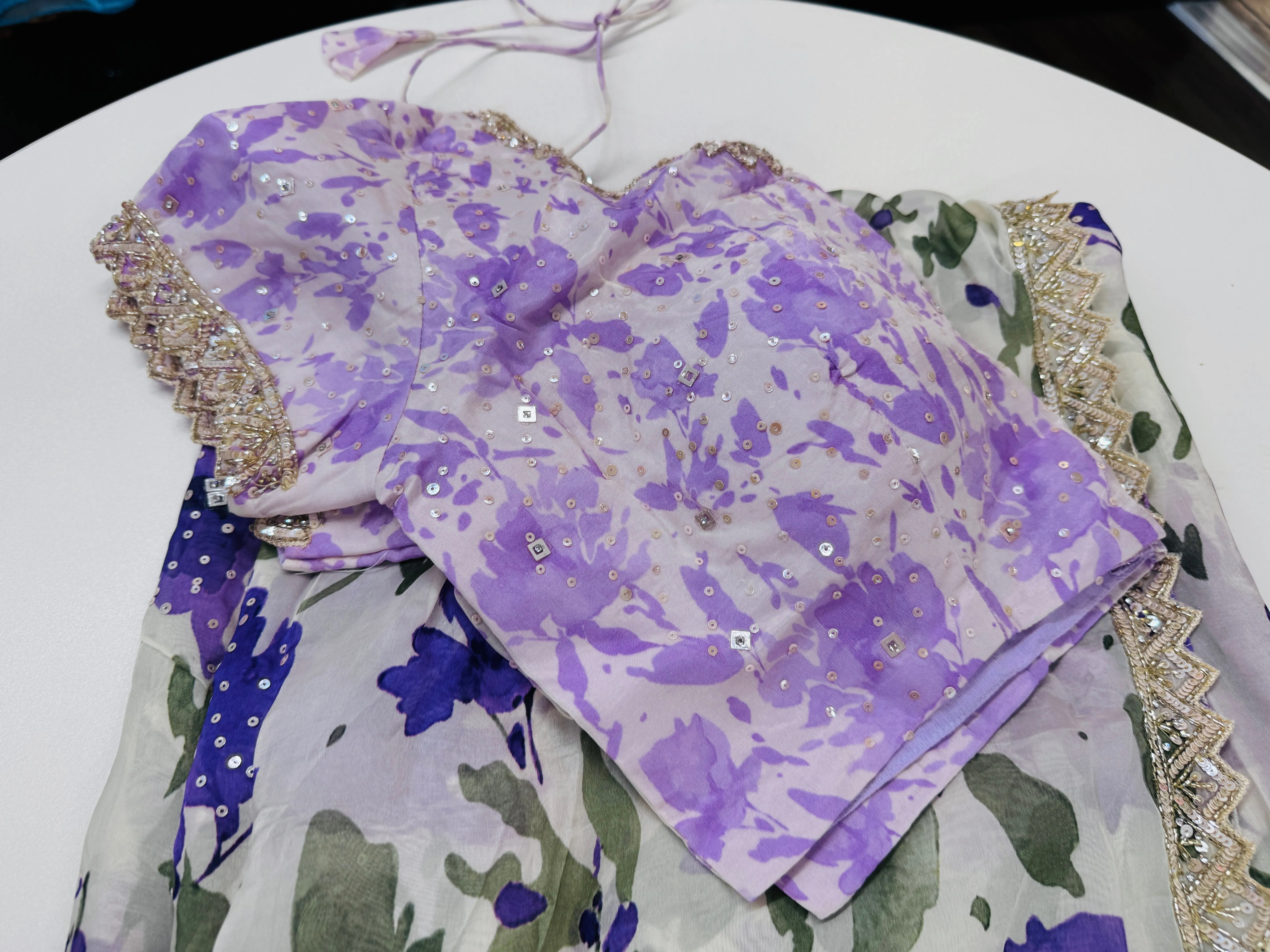 Off white purple printed Georgette saree with stitched blouse