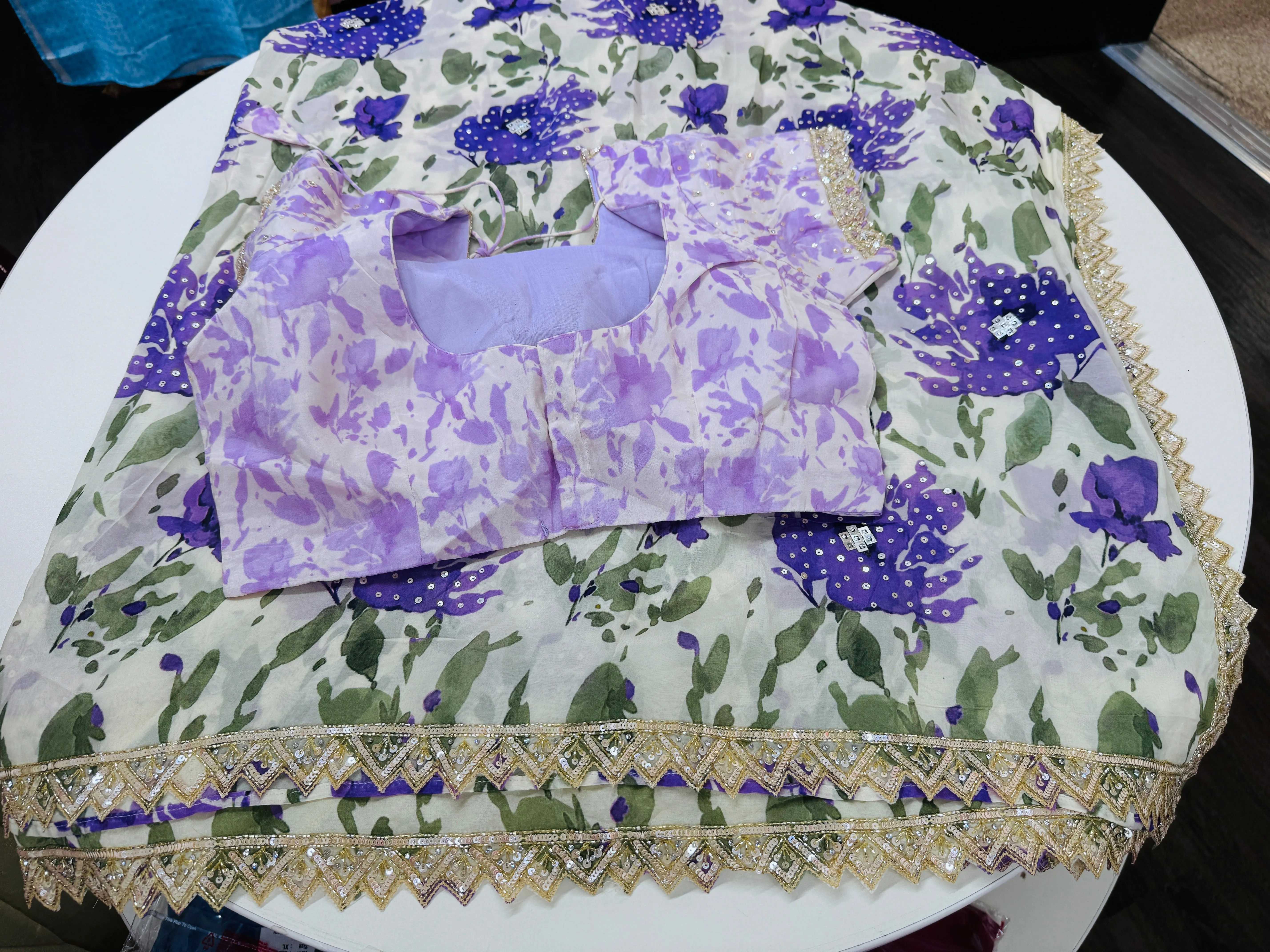 Off white purple printed Georgette saree with stitched blouse