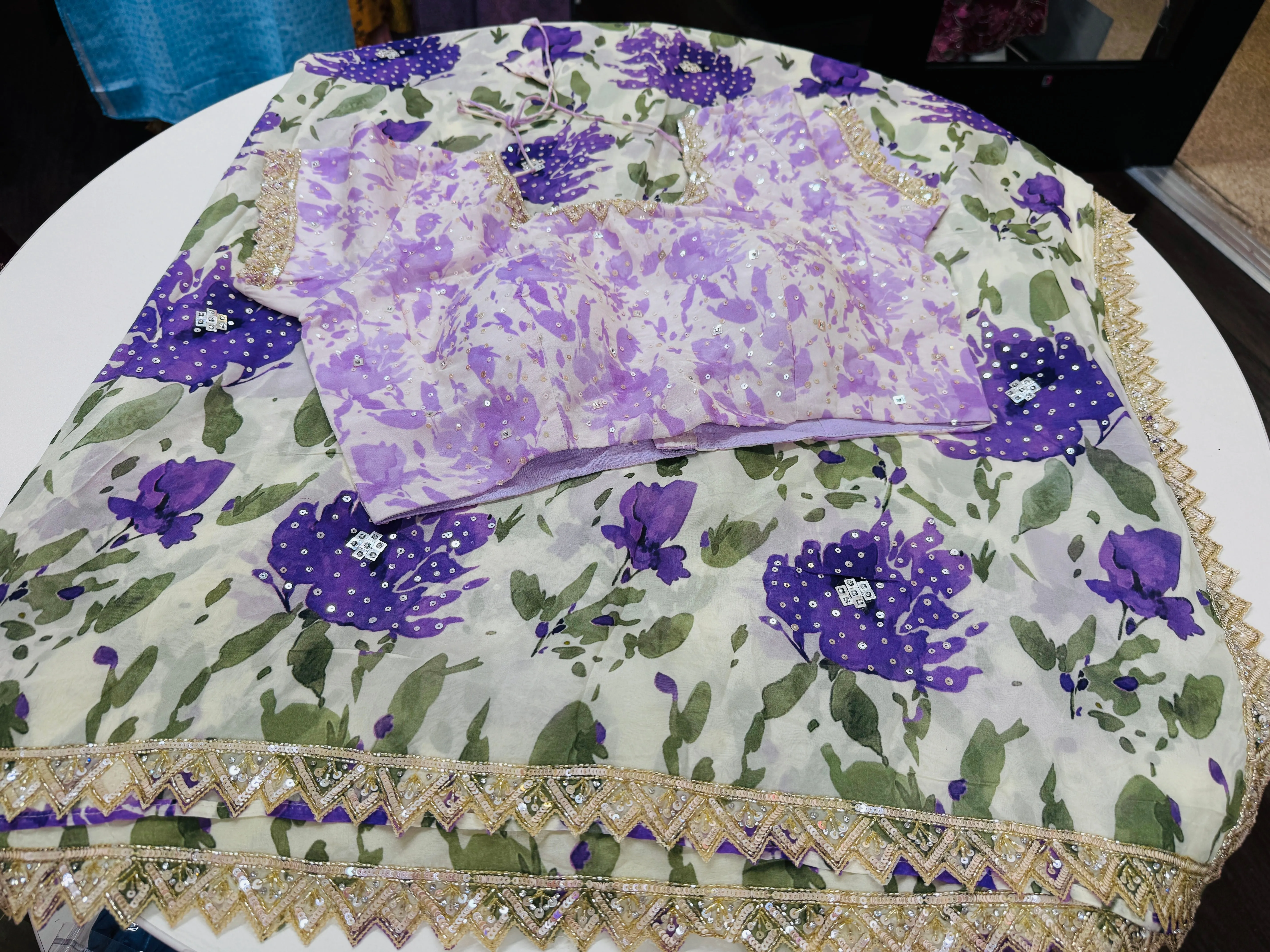 Off white purple printed Georgette saree with stitched blouse